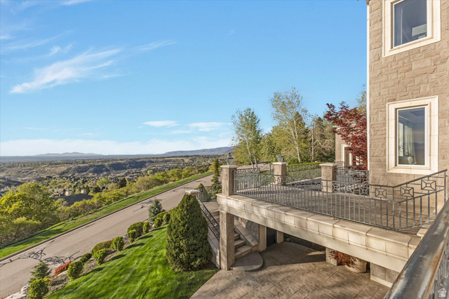3222 Eagle View Circle Sandy, UT 84092 - Photo 50 of 60 Balcony with a deck with mountain view