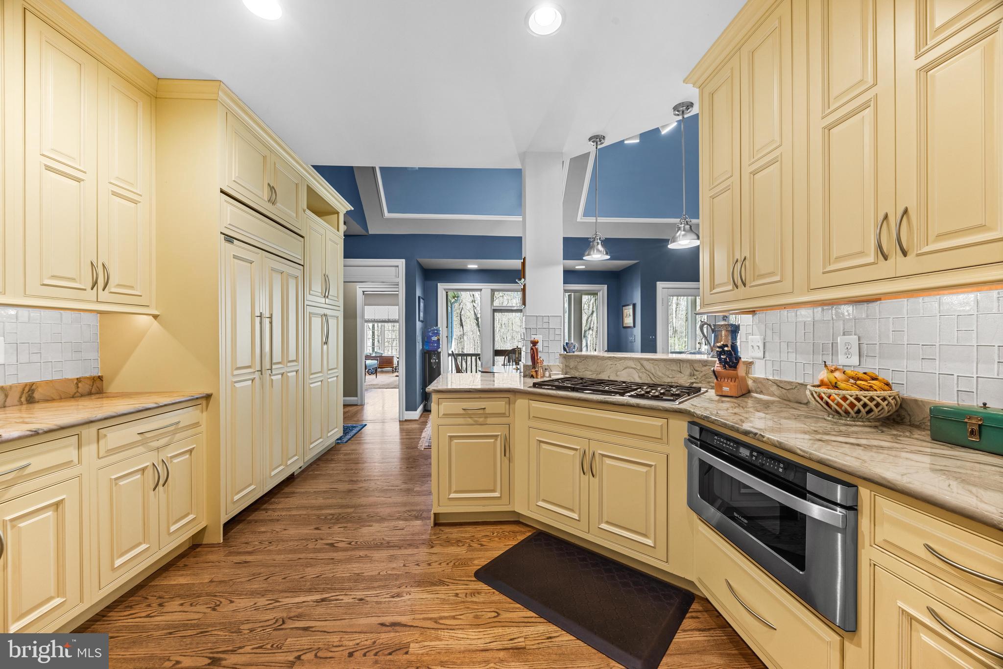 1402 Magers Landing Road Monkton, MD 21111 - Photo 15 of 64 a kitchen with stainless steel appliances granite countertop a stove and cabinets
