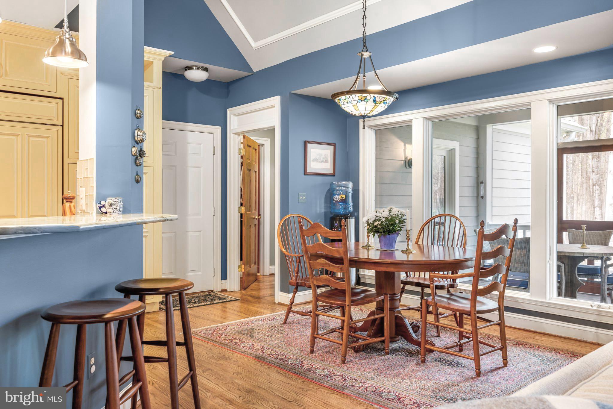 1402 Magers Landing Road Monkton, MD 21111 - Photo 19 of 64 a view of a dining room with furniture window and wooden floor