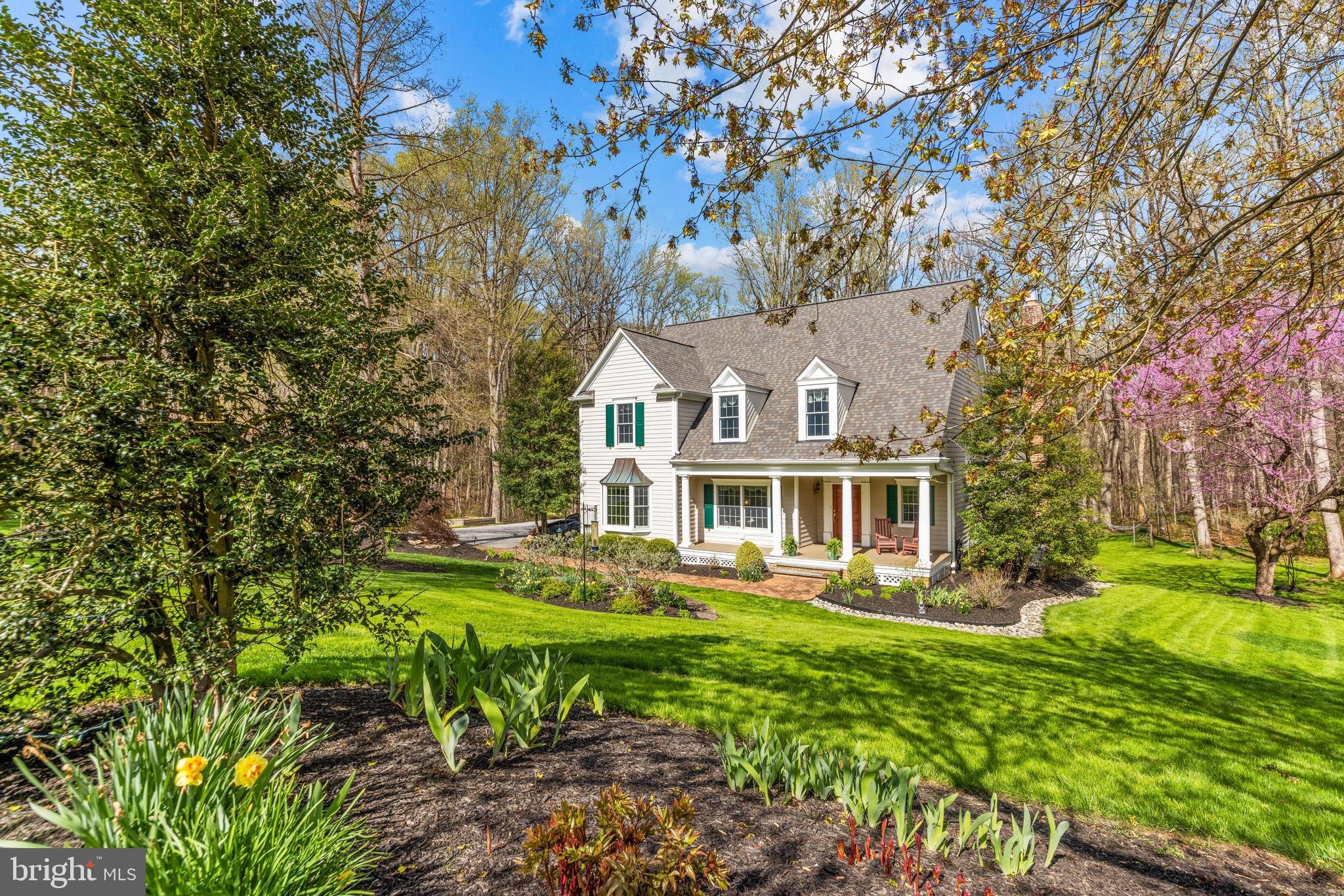1402 Magers Landing Road Monkton, MD 21111 - Photo 2 of 64 a front view of a house with garden
