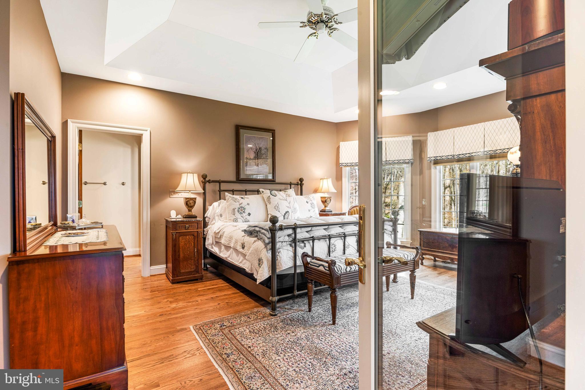 1402 Magers Landing Road Monkton, MD 21111 - Photo 26 of 64 a bedroom with furniture and large windows