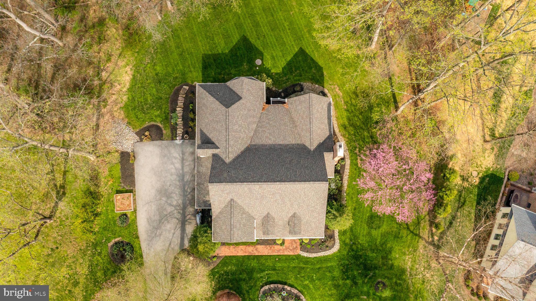 1402 Magers Landing Road Monkton, MD 21111 - Photo 4 of 64 an aerial view of a house with a yard and trees all around