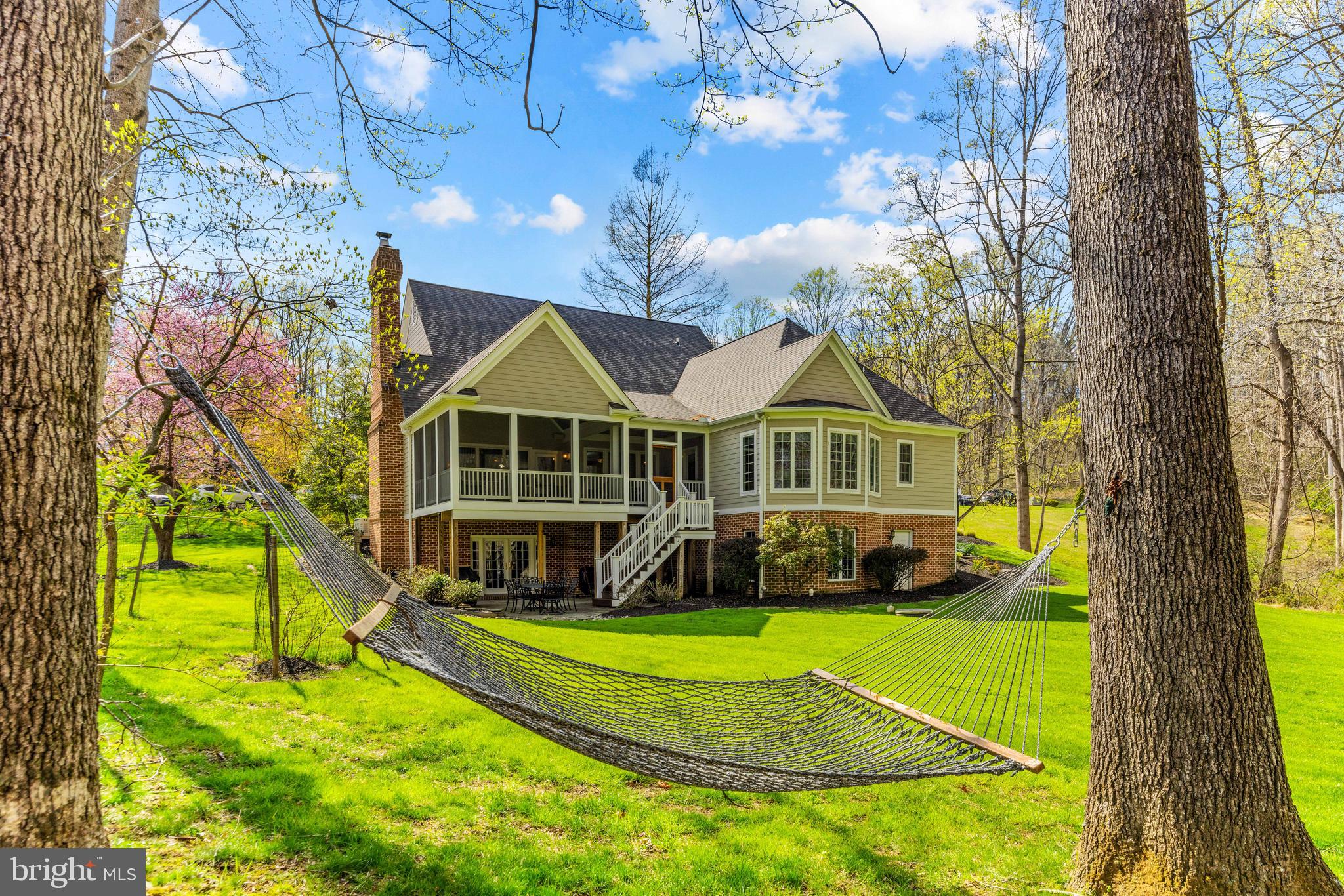 1402 Magers Landing Road Monkton, MD 21111 - Photo 57 of 64 a view of an house with backyard and swimming pool