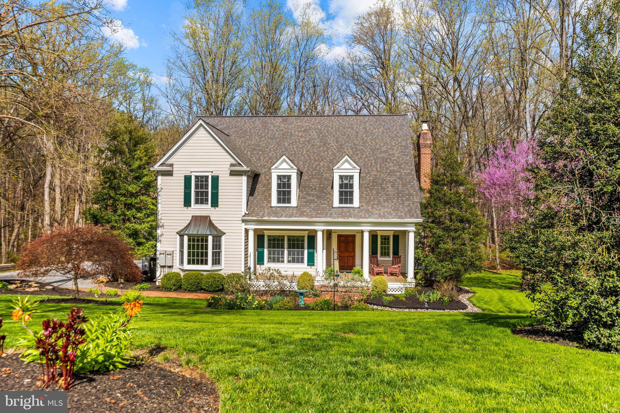 1402 Magers Landing Road Monkton, MD 21111 - Photo 6 of 64 a view of a house with a big yard potted plants and large tree