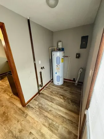 a view of a storage & utility room with sink