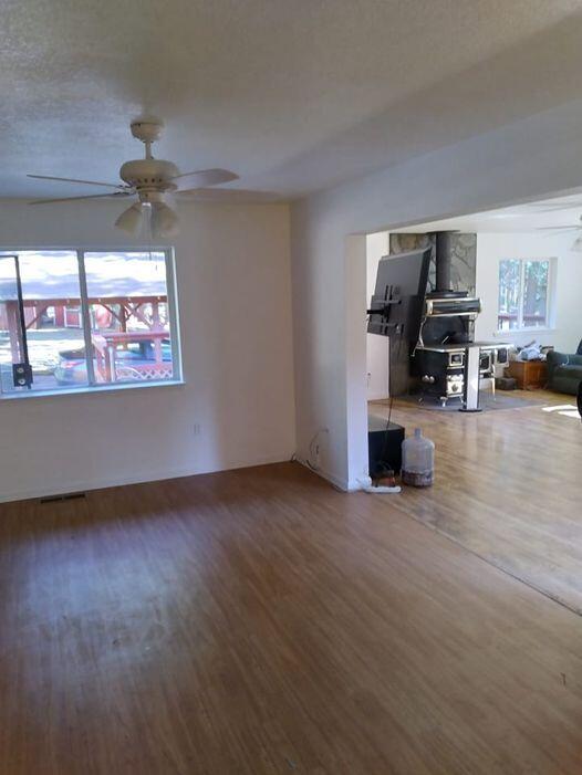14966 Phillips Road Oak Run, CA 96069 - Photo 5 of 5 an empty room with furniture and a ceiling fan