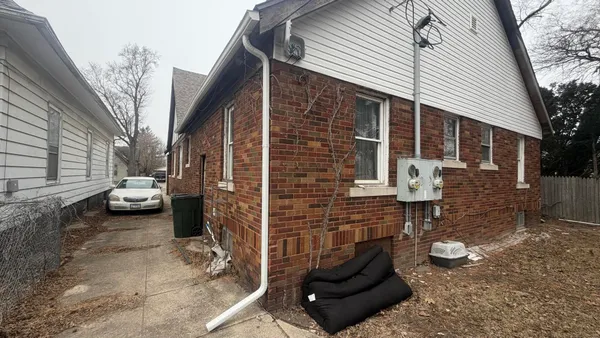 a view of a back yard of the house