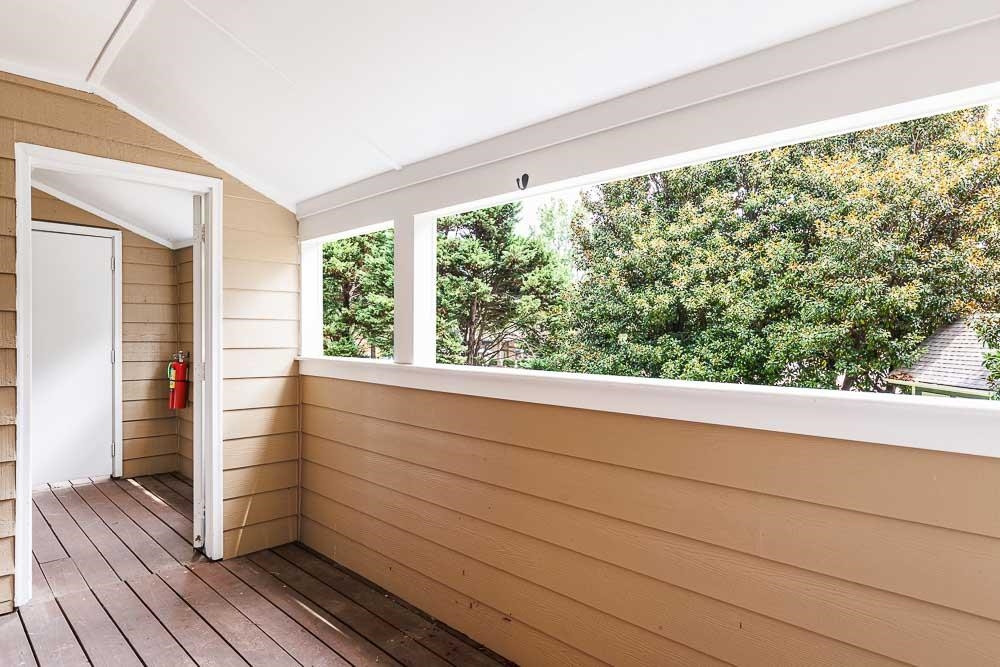 3249 Mill Run, Unit 190 Raleigh, NC 27612 - Photo 4 of 23 Covered patio with secure door. An easy, private place to relax in! Patio/Deck