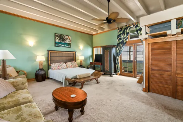 a room with furniture and a chandelier