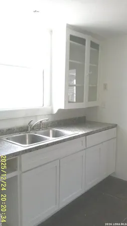 a view of a sink and a mirror