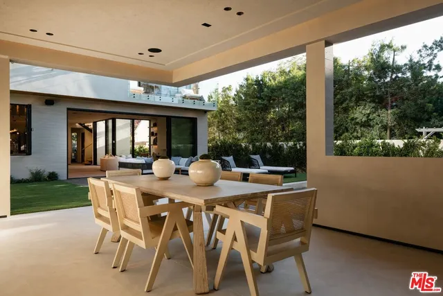 a kitchen with a sink a stove and cabinets