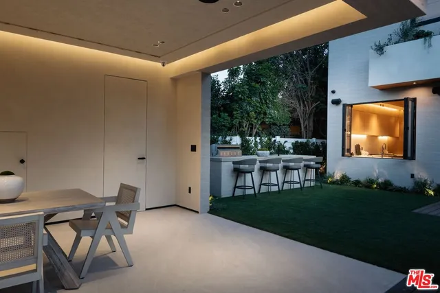 a outdoor living space with furniture and garden view