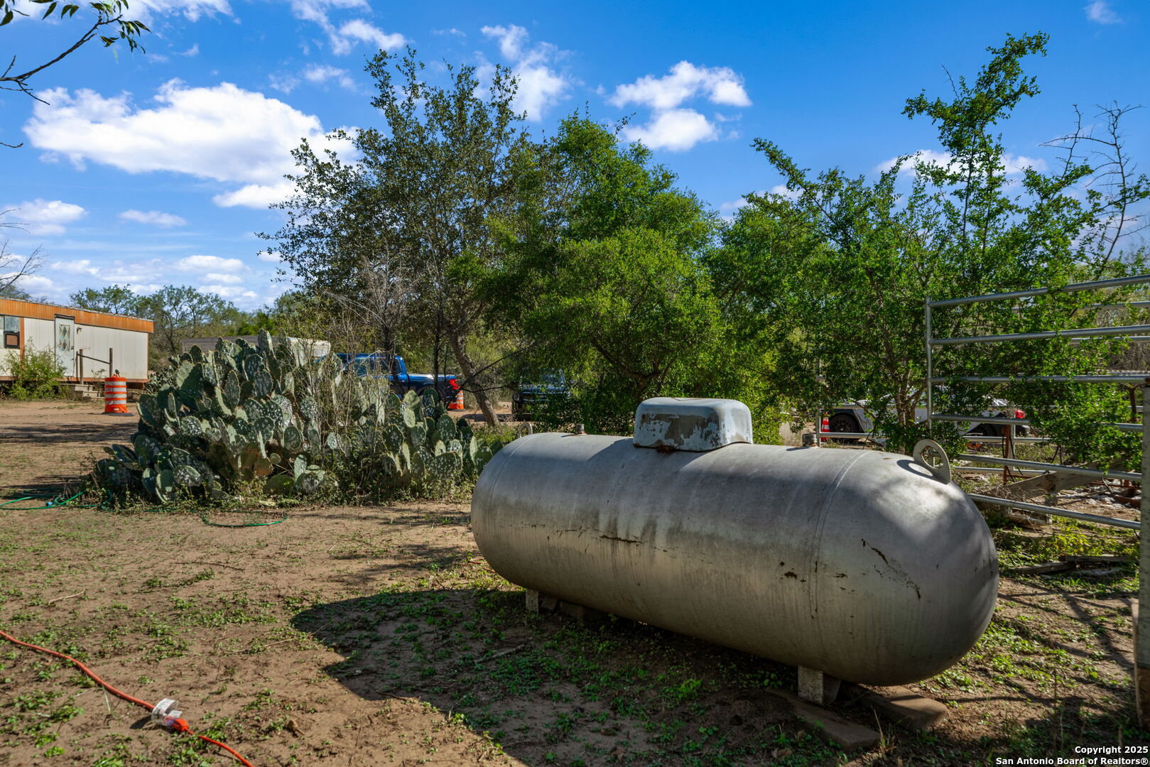 14350 Interstate 35 Access Road Von Ormy, TX 78073 - Photo 34 of 45 a view of a backyard with plants and outdoor seating