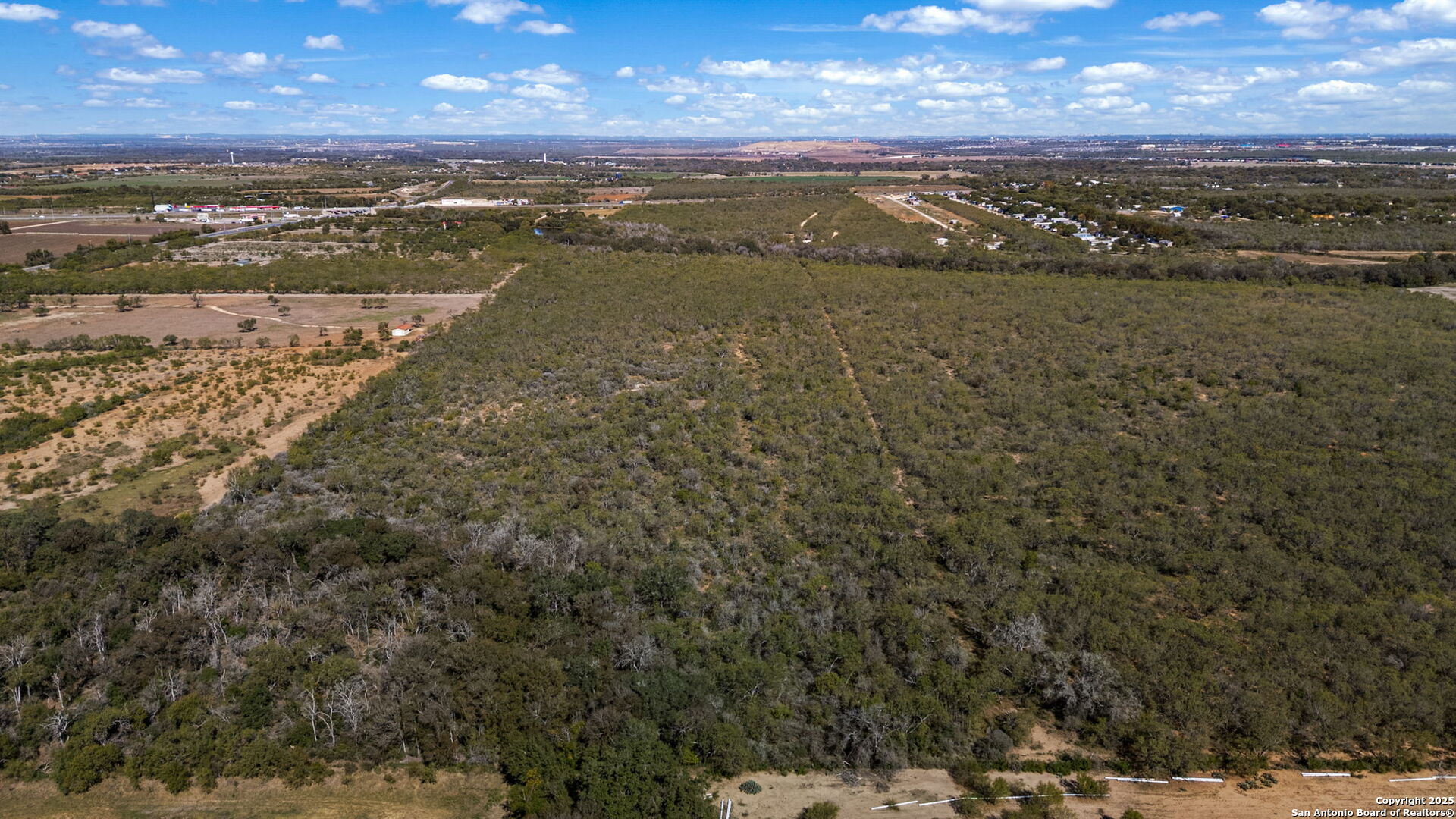 14350 Interstate 35 Access Road Von Ormy, TX 78073 - Photo 5 of 45 a view of an ocean beach and mountain