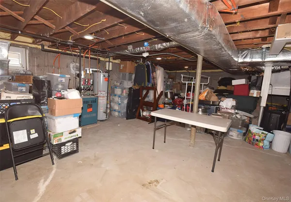 a living room with furniture a table and a large window