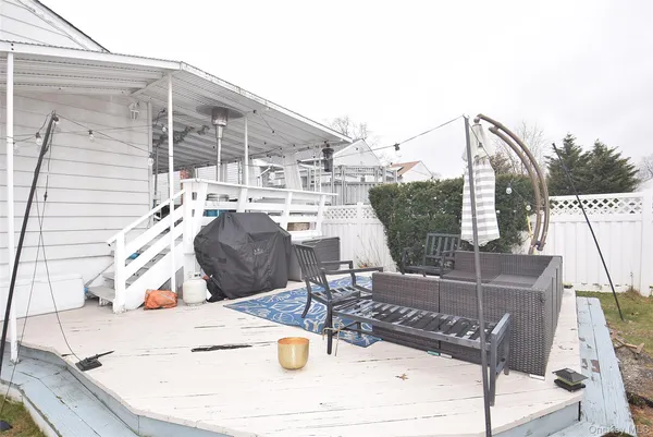 a view of a swimming pool with chairs