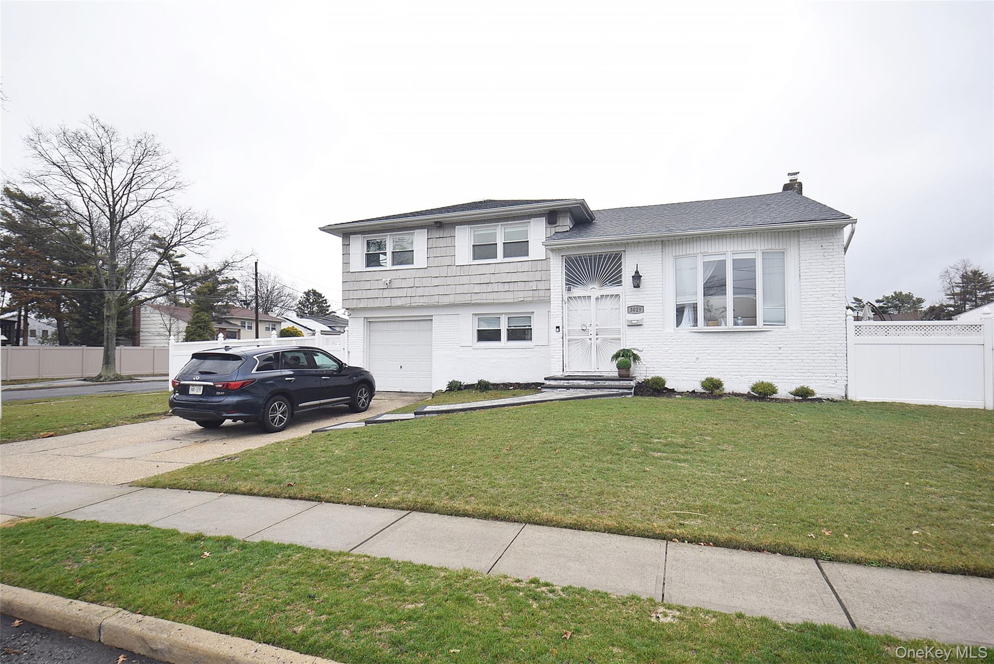 3029 Ann Street Baldwin, NY 11510 - Photo 26 of 26 a house view with a garden space