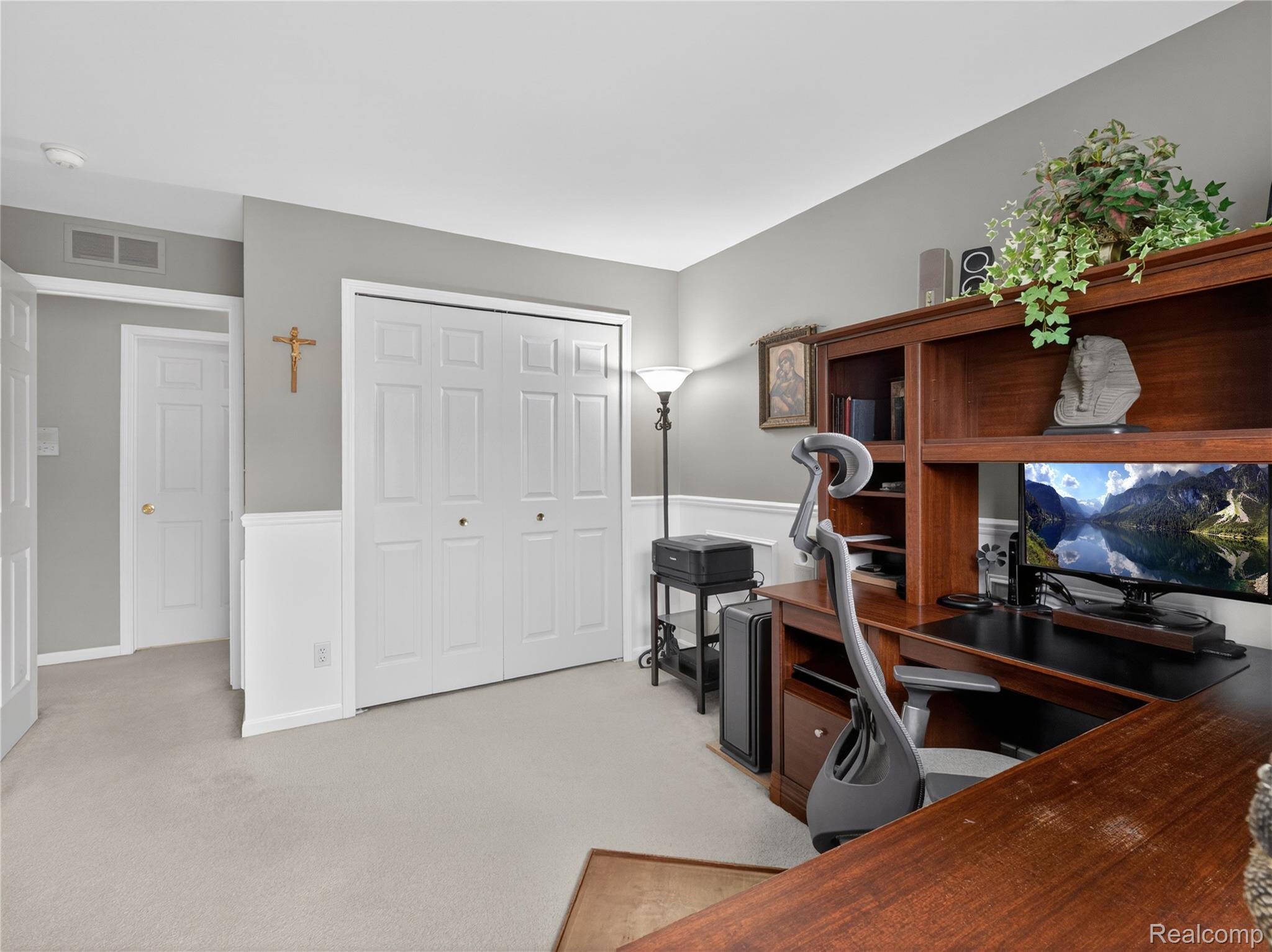 1834 Flagstone Circle, Unit 37 Rochester, MI 48307 - Photo 16 of 31 Office space with light carpet and wainscoting