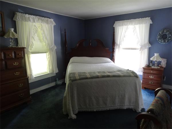 40 Moran Road Hardwick, MA 01031 - Photo 12 of 15 a bedroom with a bed and a window