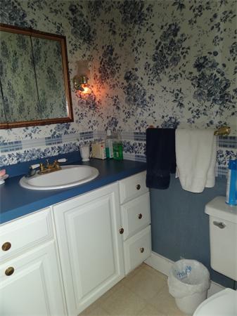 40 Moran Road Hardwick, MA 01031 - Photo 13 of 15 a bathroom with a sink and a mirror