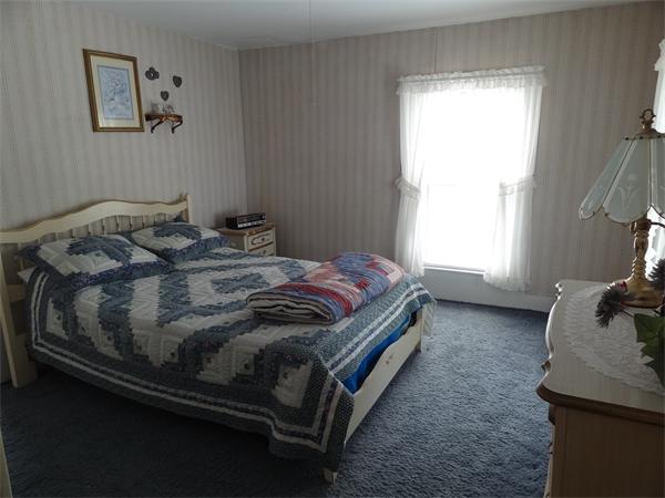 40 Moran Road Hardwick, MA 01031 - Photo 14 of 15 a bed sitting in a bedroom next to a window