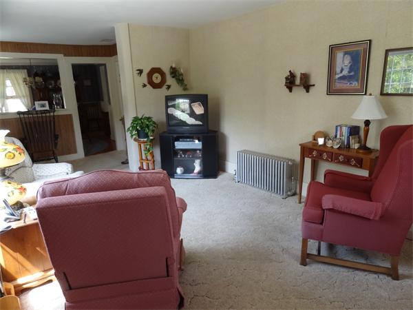 40 Moran Road Hardwick, MA 01031 - Photo 5 of 15 a living room with furniture and a mirror