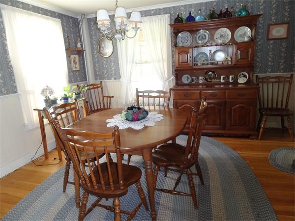 40 Moran Road Hardwick, MA 01031 - Photo 7 of 15 a view of a dining room with furniture and chandelier