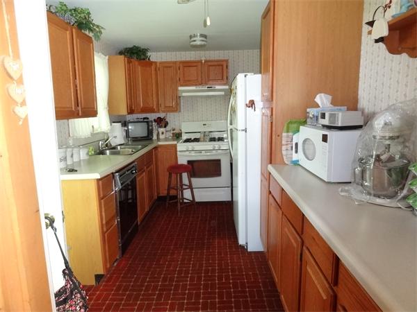 40 Moran Road Hardwick, MA 01031 - Photo 10 of 15 a kitchen with a sink stove and refrigerator