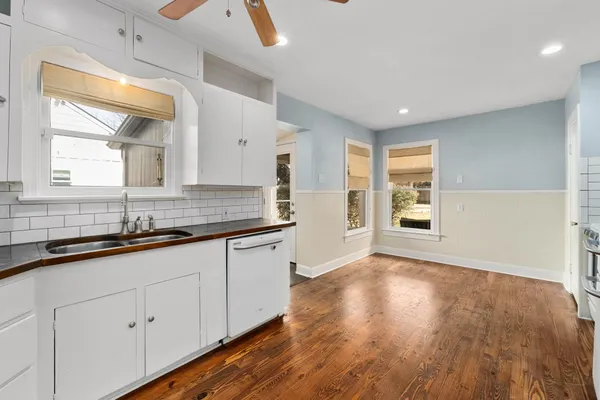 a bathroom with sink and mirror