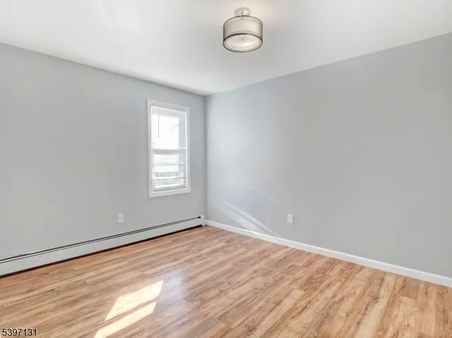 a bathroom with a toilet a sink and bathtub