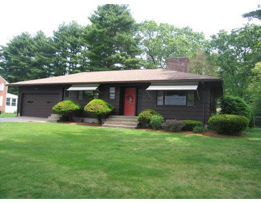 63 Pine Acre Road Springfield, MA 01129 - Photo 1 of 1 a view of a house with backyard sitting area and garden