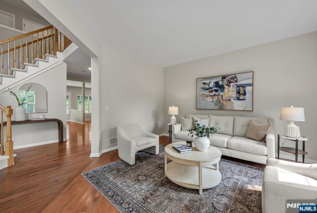1 Winding Ridge Road Lake Hopatcong, NJ 07849 - Photo 5 of 50 a living room with furniture and a rug