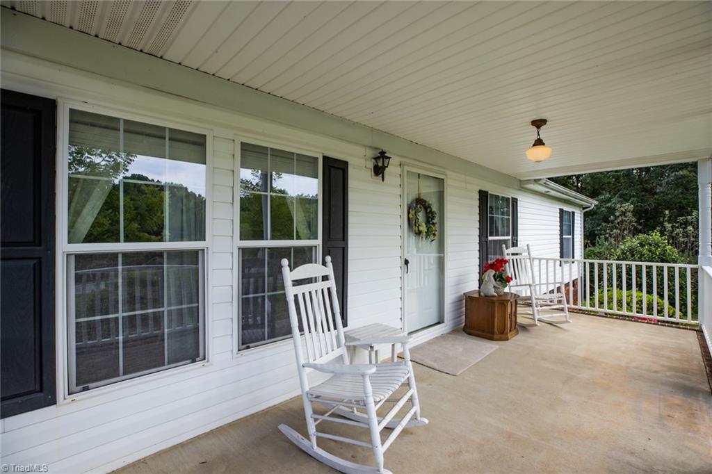 5069 Wilkes Yadkin Road Ronda, NC 28670 - Photo 15 of 37 Front porch