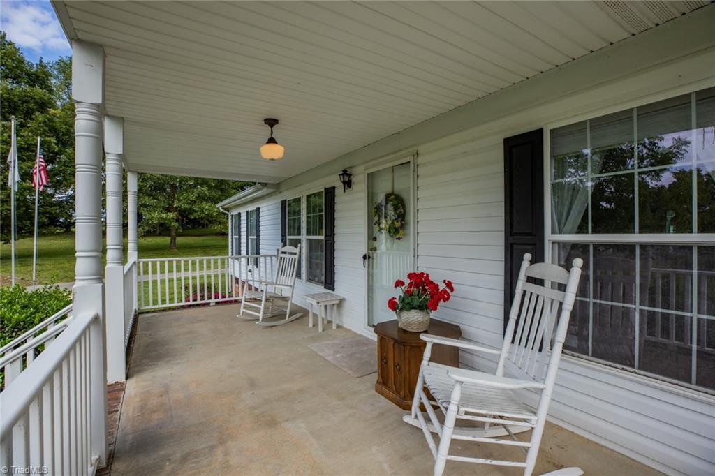 5069 Wilkes Yadkin Road Ronda, NC 28670 - Photo 16 of 37 Front porch