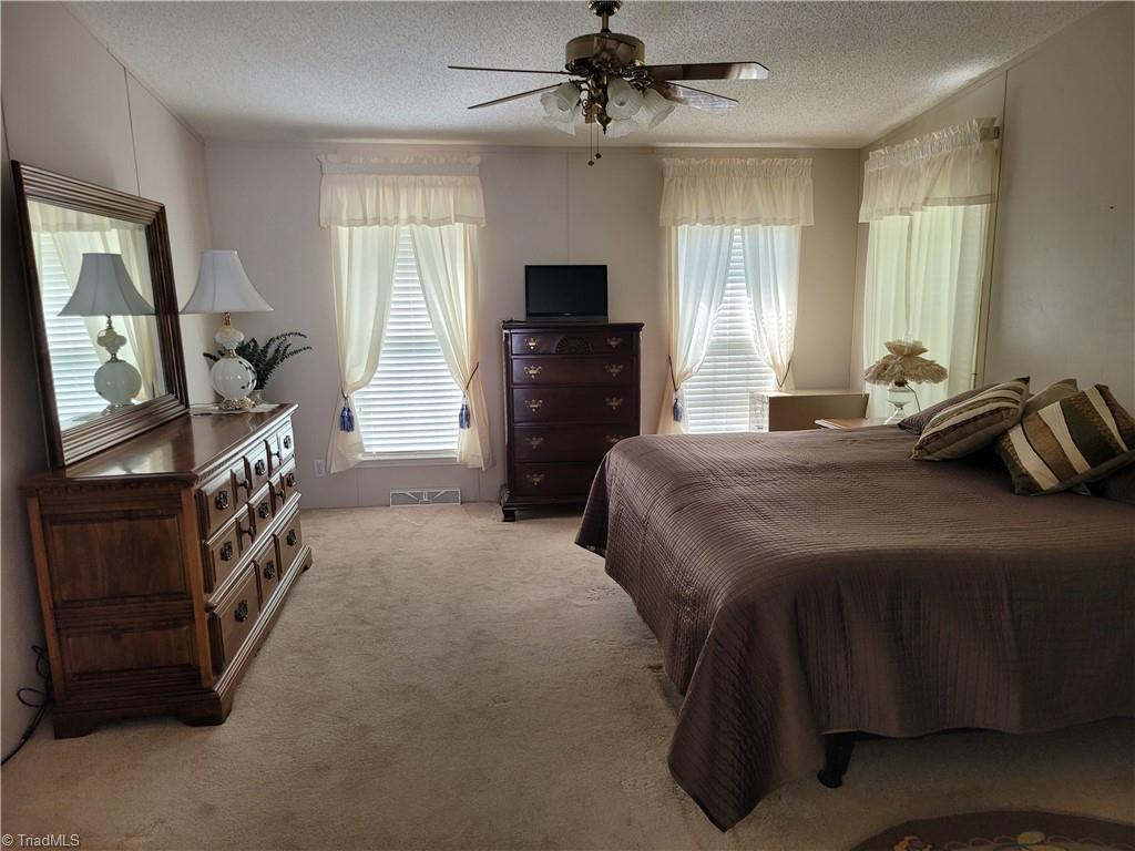 5069 Wilkes Yadkin Road Ronda, NC 28670 - Photo 27 of 37 Primary bedroom