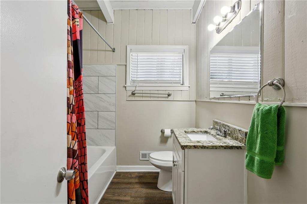 1291 Richard Road Decatur, GA 30032 - Photo 12 of 16 a bathroom with a sink toilet and shower