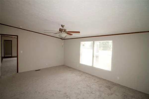 a bathroom with a shower and toilet