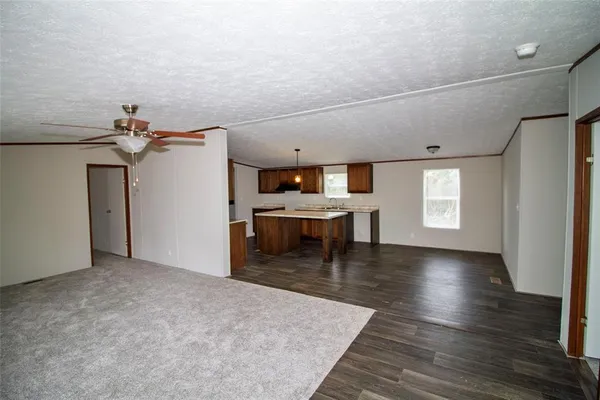 a view of a livingroom with a furniture