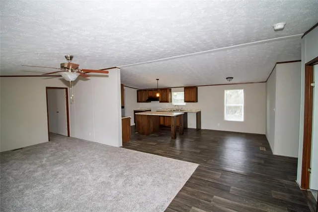 a view of a livingroom with a furniture