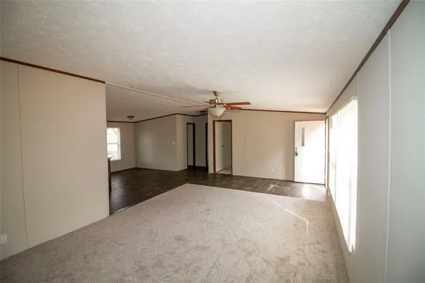 a view of empty room with windows