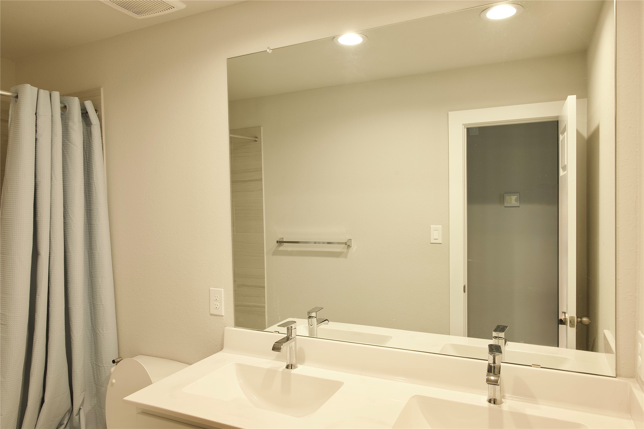 3207 Tilley Drive Rosenberg, TX 77471 - Photo 35 of 43 a bathroom with a sink and a mirror
