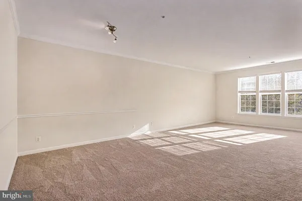 a view of empty room with a window