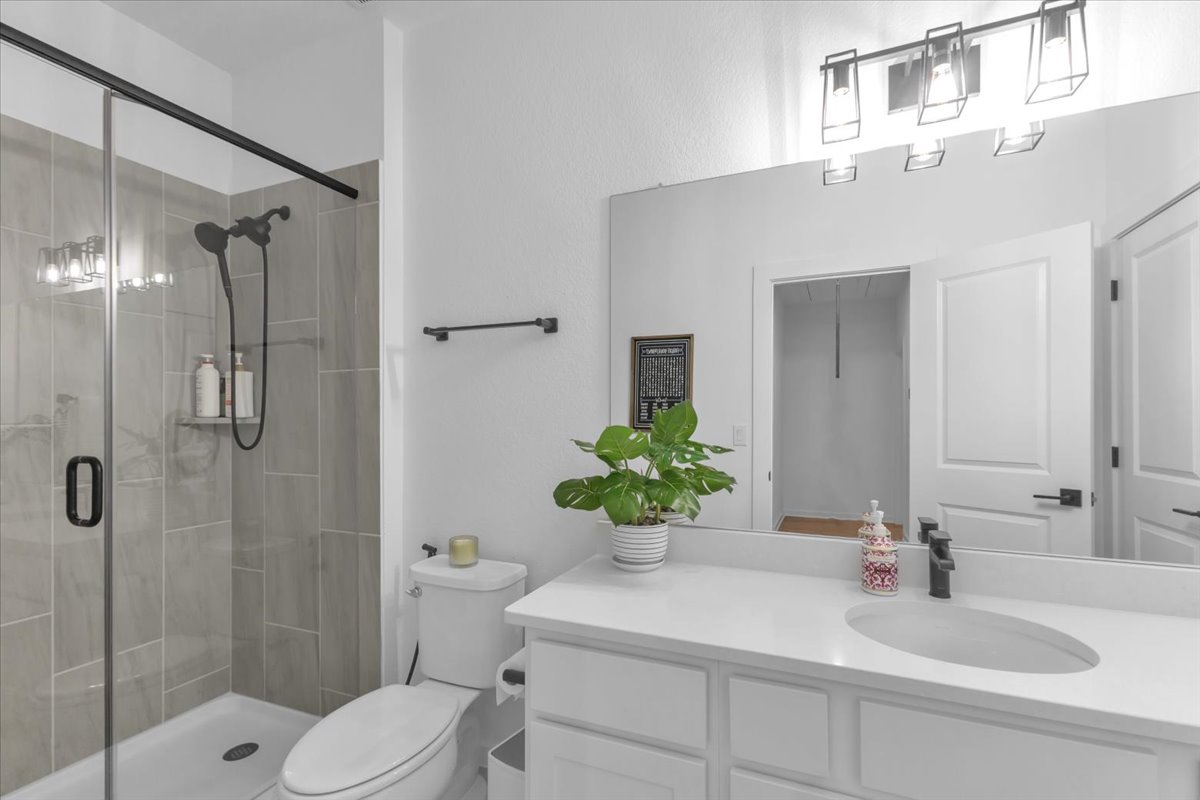 2312 Mondello Path Leander, TX 78641 - Photo 30 of 40 Full bath featuring vanity and a stall shower