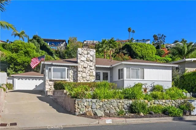 front view of a house with a street