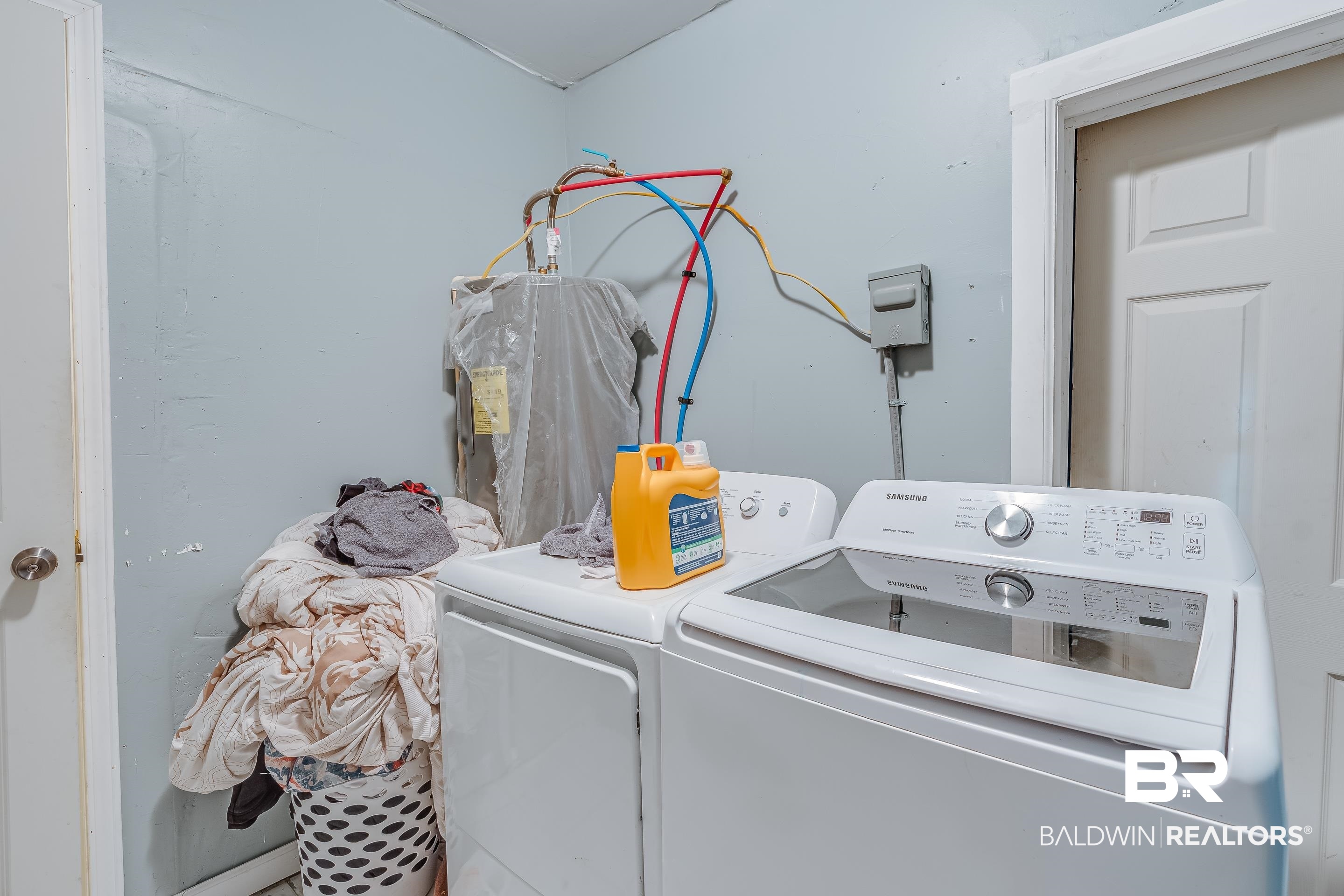 14 Southern Street Mobile, AL 36611 - Photo 15 of 26 Clothes washing area with washer and dryer