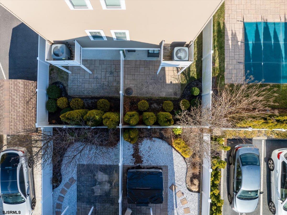 16 South Decatur Avenue, Unit A Margate City, NJ 08402 - Photo 37 of 51 a front view of a building with glass windows