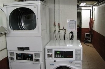 10 Skyline Drive, Unit 5 Braintree, MA 02184 - Photo 11 of 13 a view of living room with washer and dryer