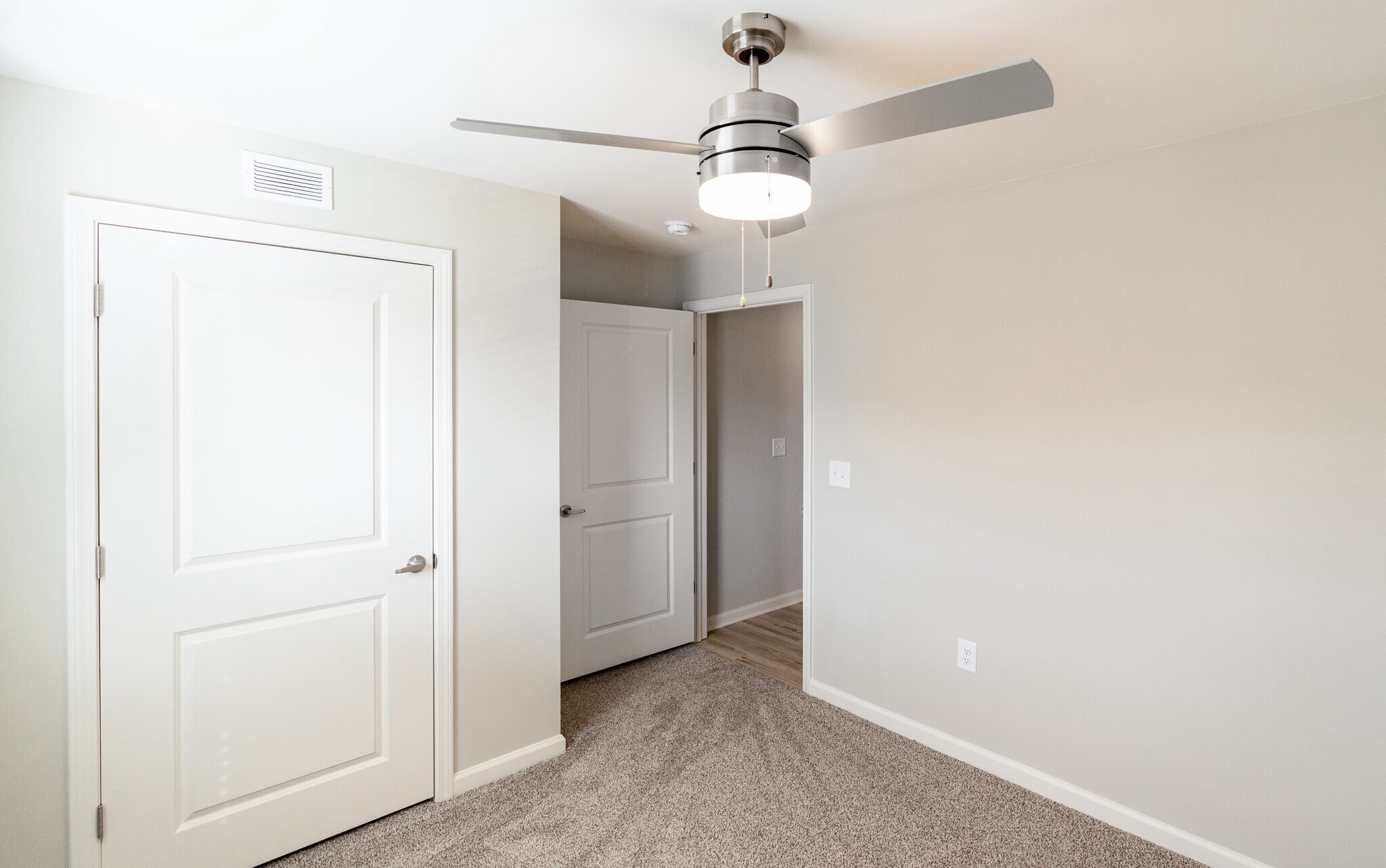 3432 Carr Road Durham, NC 27703 - Photo 14 of 28 an empty room with wooden floor