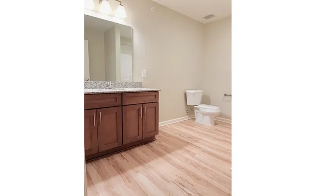 a kitchen with stainless steel appliances a refrigerator and a sink