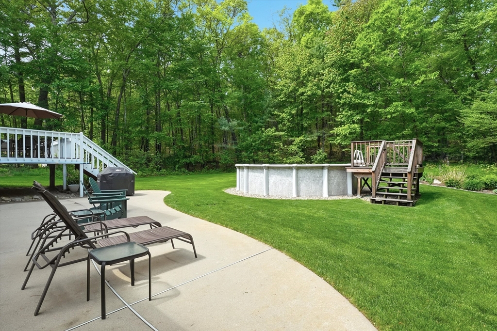 9 Fazio Farm Road Georgetown, MA 01833 - Photo 35 of 42 a view of a house with backyard and sitting area
